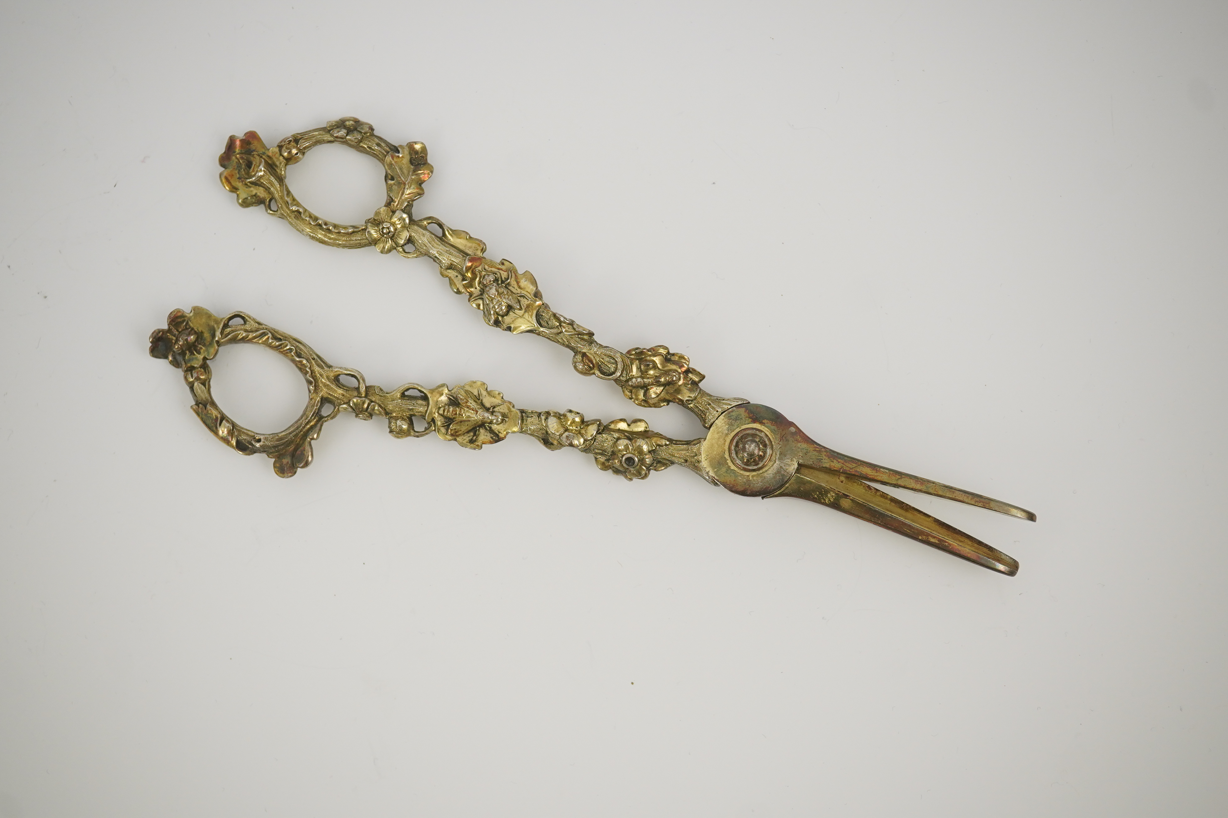 A cased pair of William IV Paul Storr silver gilt grape shears, in later case